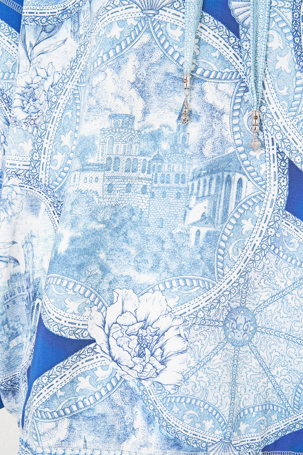 The CAMILLA contrast band hoodie with side pockets in our print De Nada Granada.