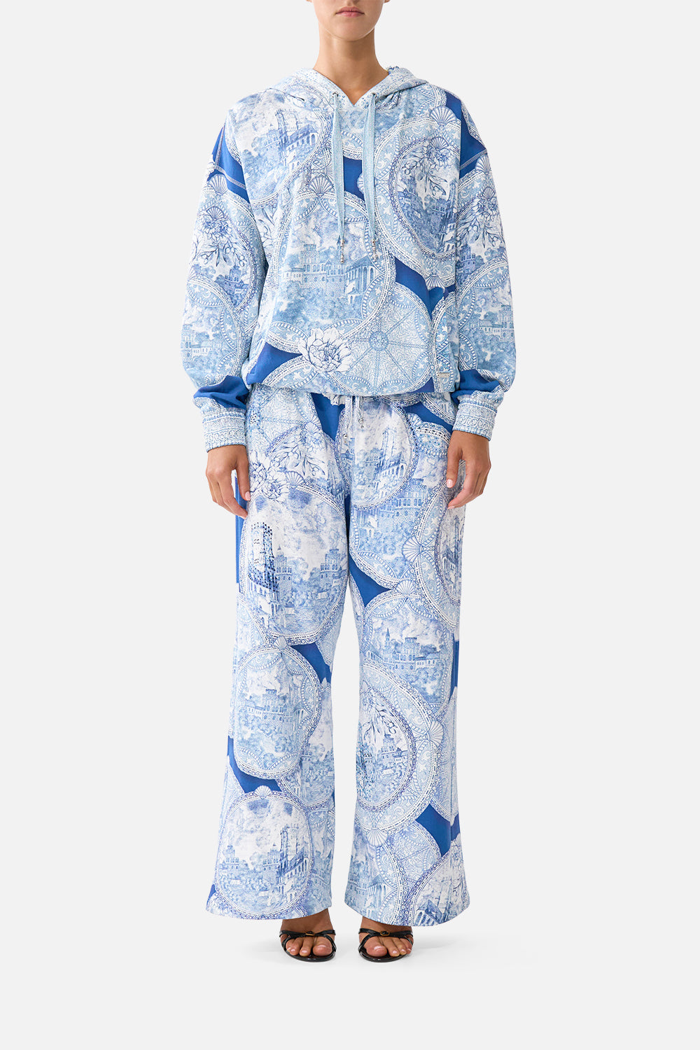 The CAMILLA contrast band hoodie with side pockets in our print De Nada Granada. Front model view.