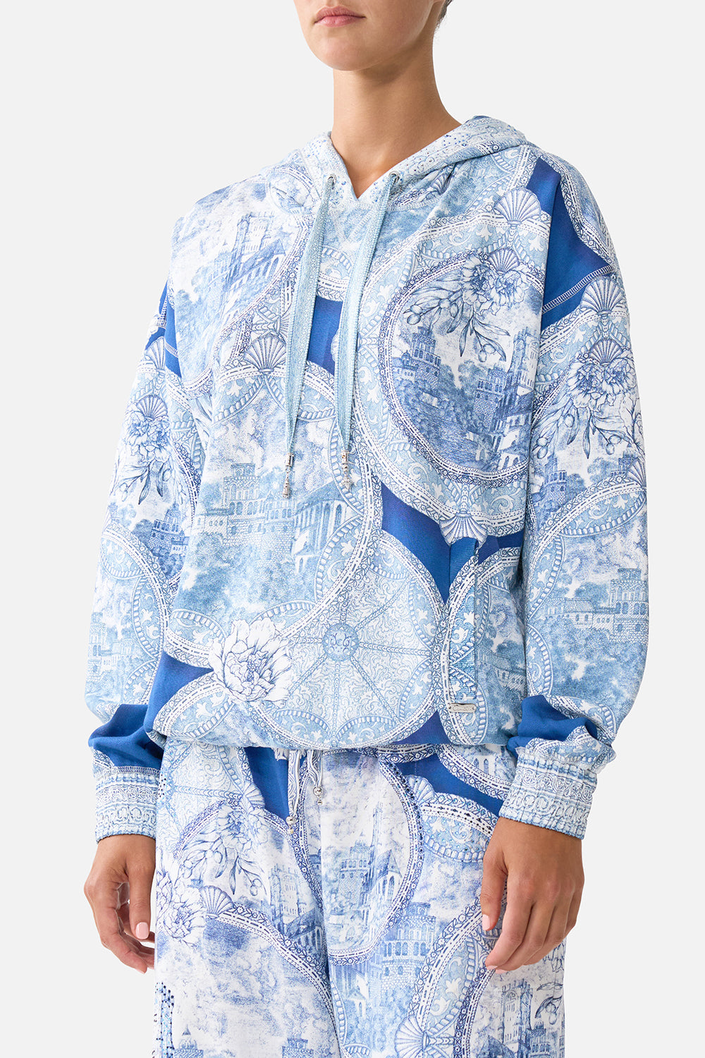 The CAMILLA contrast band hoodie with side pockets in our print De Nada Granada.