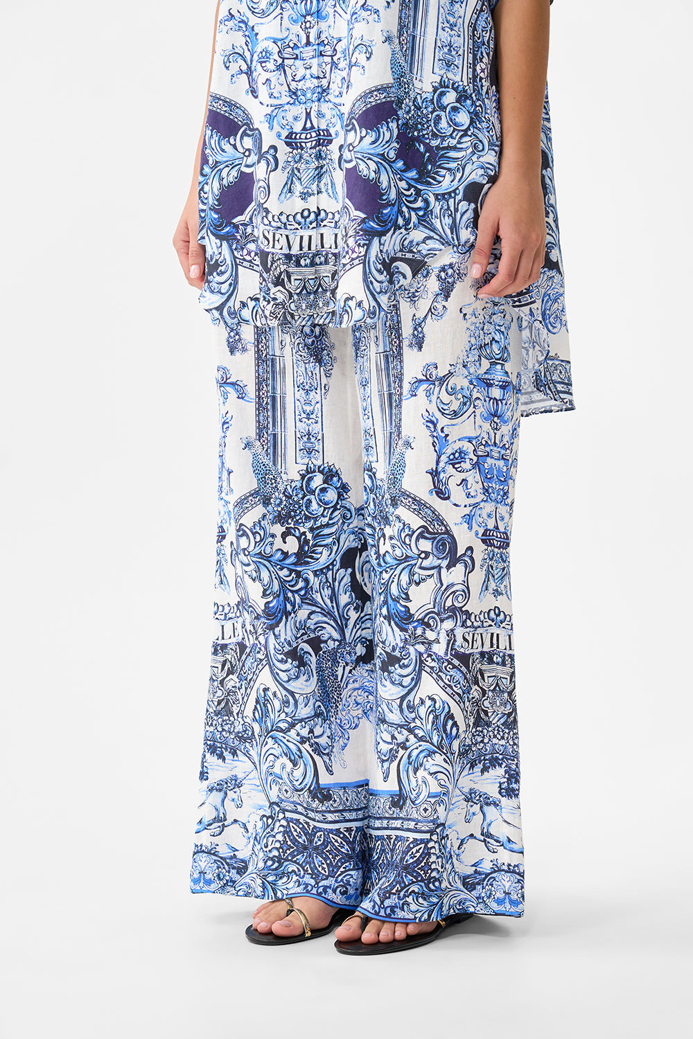 The CAMILLA minimal wide leg pant in our print A Tiled Wonderland. Side model view.