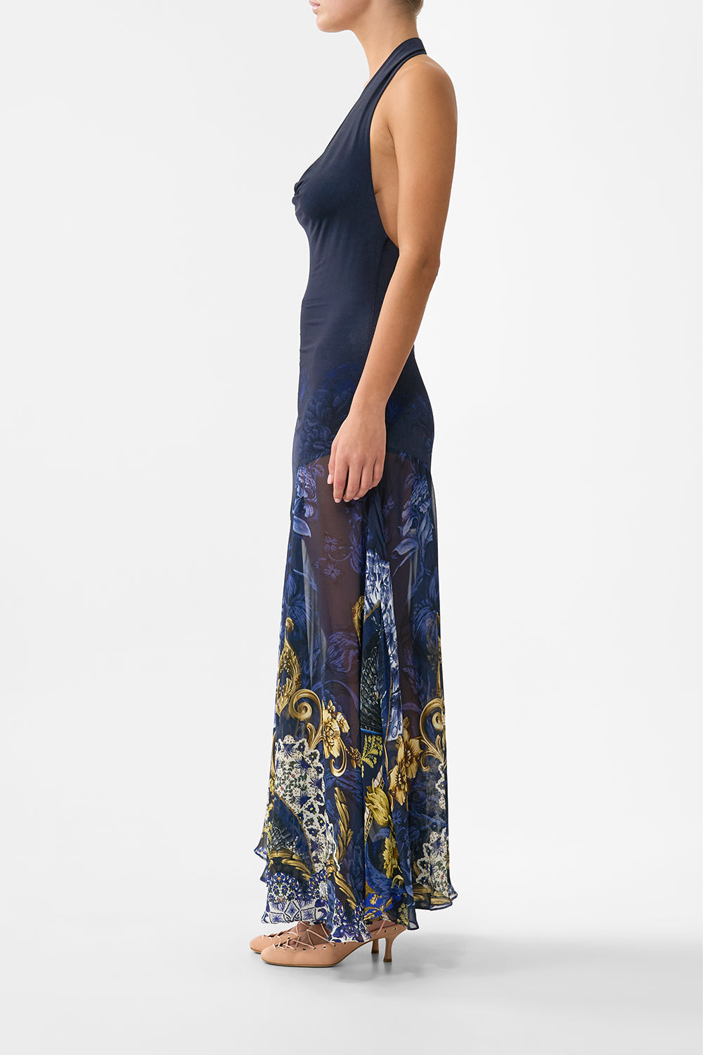 The CAMILLA cowl neck halter dress in our print Notes from the Blue Room. Side model view.