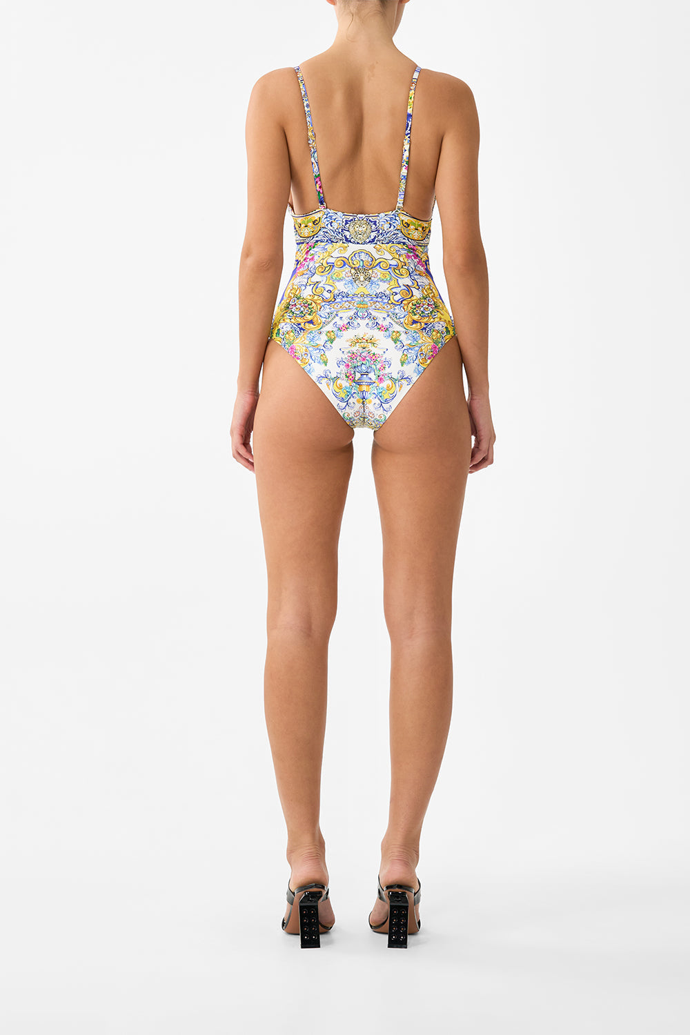 The CAMILLA high tri one piece with eyelet tie front trim in our print España Nirvana. Back model view.