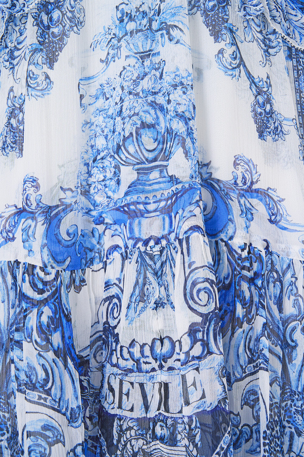 The CAMILLA TIERED SWING MINI DRESS A TILED WONDERLAND in our  print.