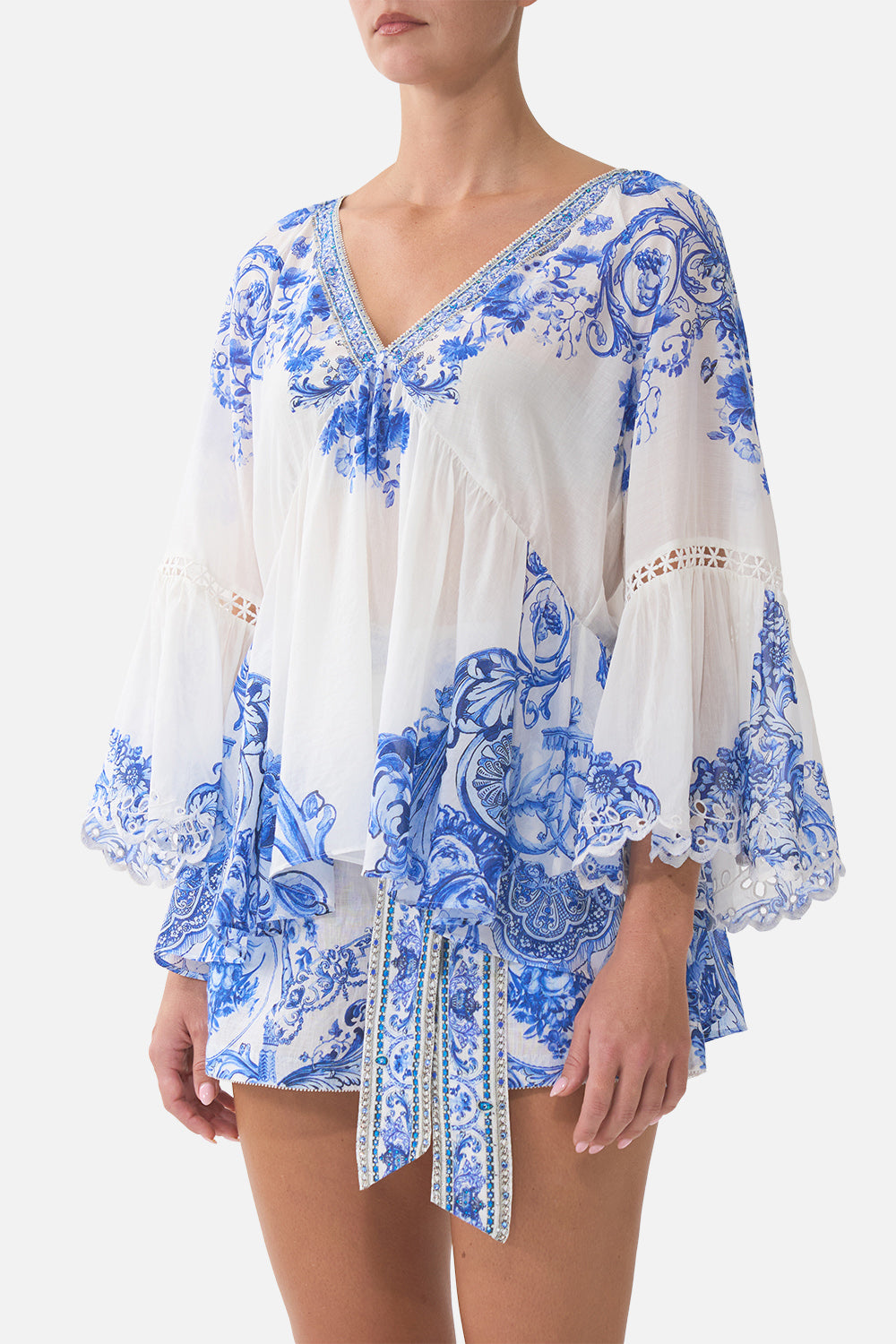 BLUSA RAGLÁN CON VOLANTE EN LA MANGA CERÁMICO PANORÁMICO