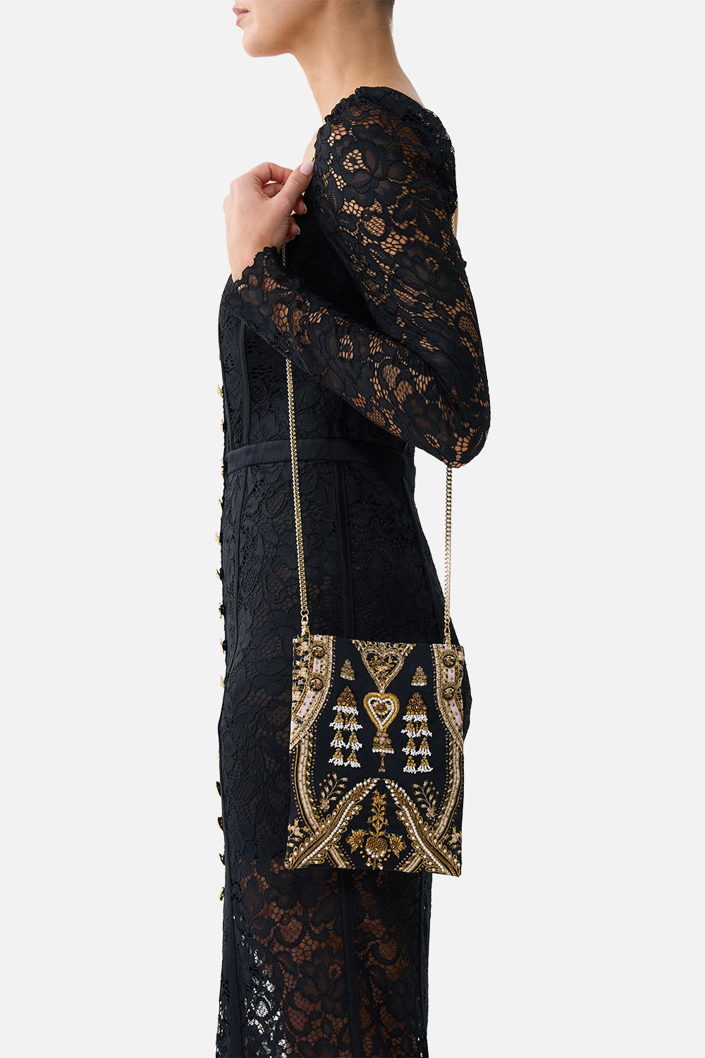 MINIBOLSO ADORNADO CON CADENA TAURO ASCENDENTE