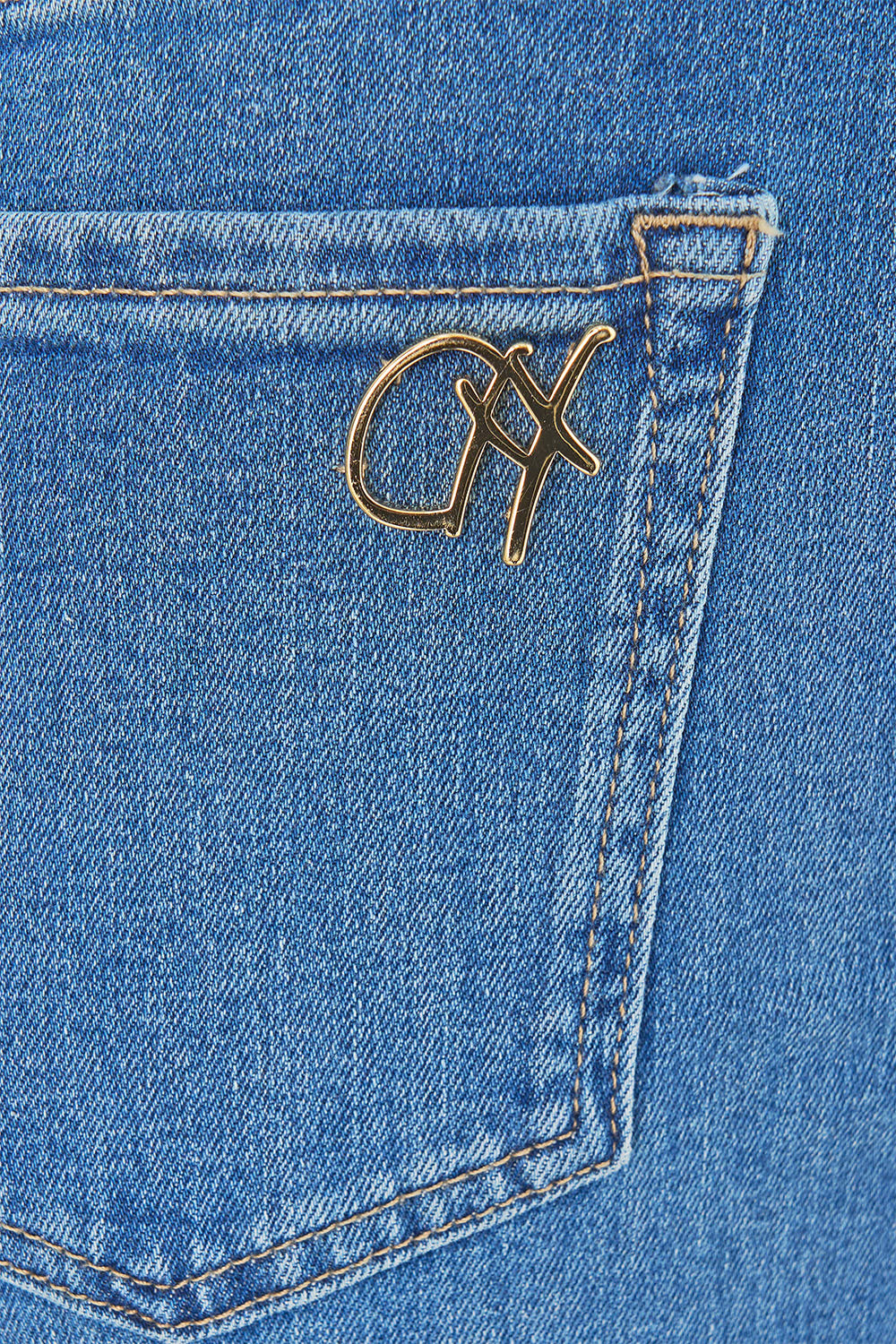 AMANDA TAURUS RISING PANTALÓN VAQUERO FLARE HARDWARE