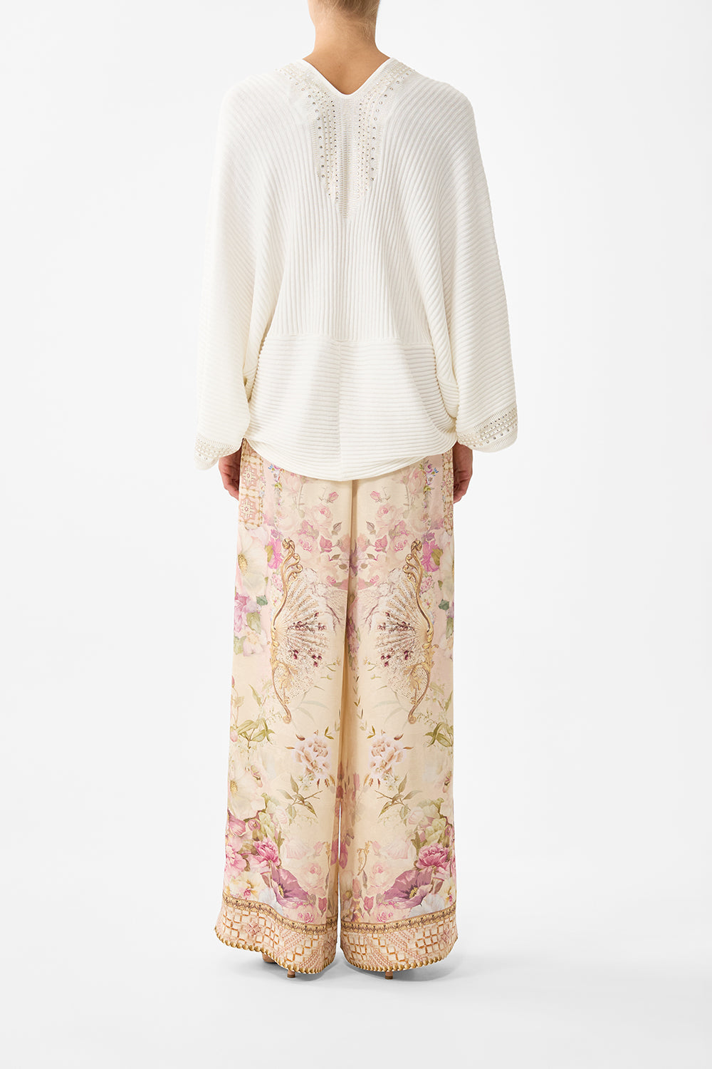The CAMILLA RELAXED V NECK KNIT TOP THE HUM OF THE ALHAMBRA in our  print.