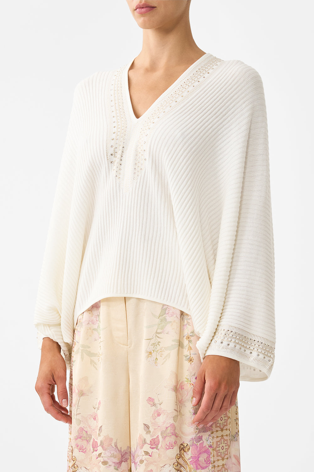 The CAMILLA RELAXED V NECK KNIT TOP THE HUM OF THE ALHAMBRA in our  print.