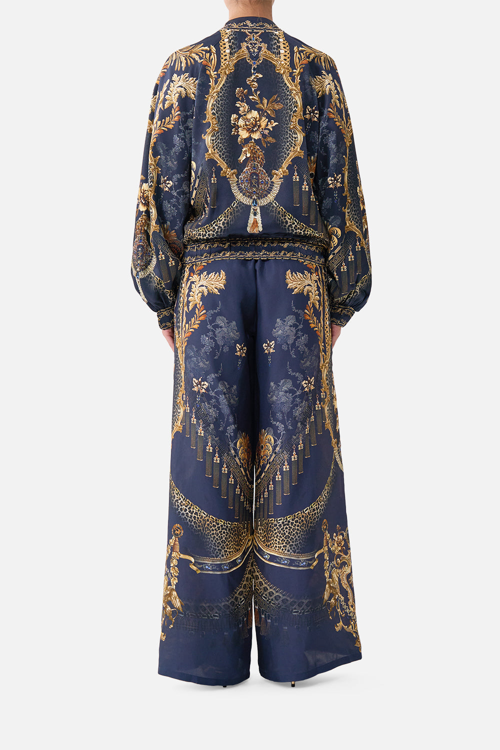 BOMBER JACKET WITH SHIRRED CUFF CLOAKED IN BAROQUE