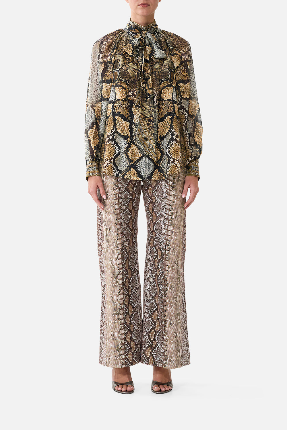The CAMILLA High Rise Flared Leather Pant in Print Animalia Heirlooms. Model View