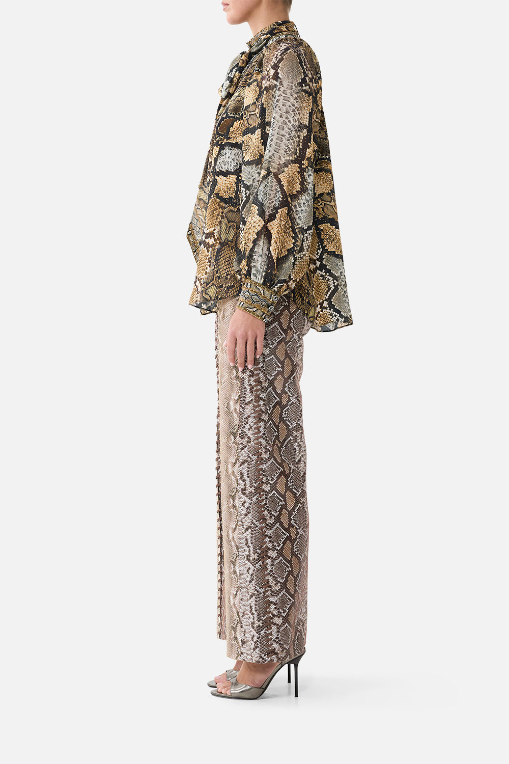 The CAMILLA High Rise Flared Leather Pant in Print Animalia Heirlooms. Model View