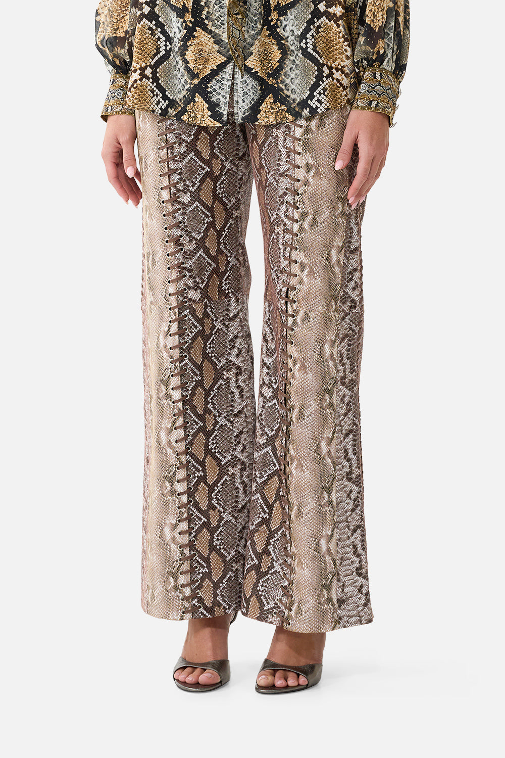The CAMILLA High Rise Flared Leather Pant in Print Animalia Heirlooms. Model View