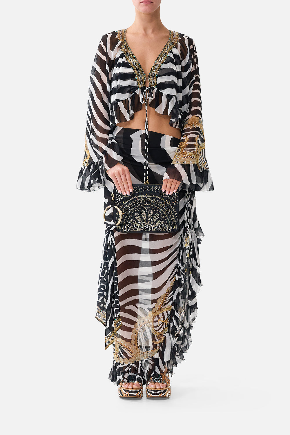 The CAMILLA Ring Scarf Clutch in Print Zig Zag Zoo. Model View