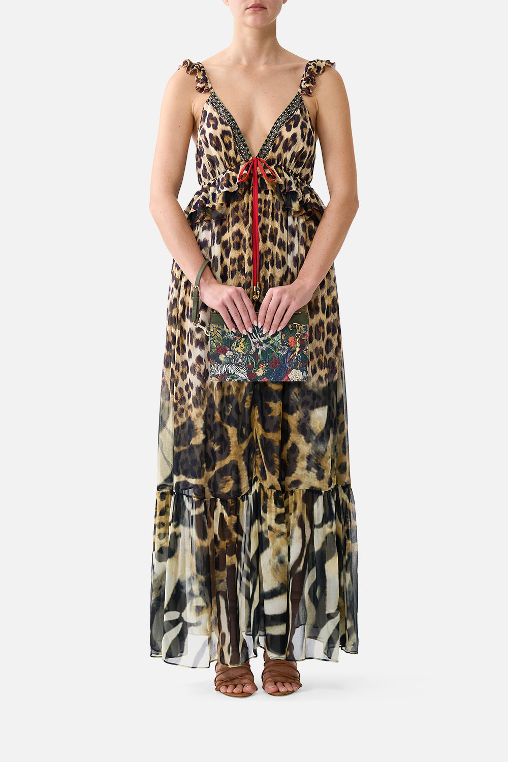 The CAMILLA Clutch with Wristlet in our Leotigra Land print, front view on model.