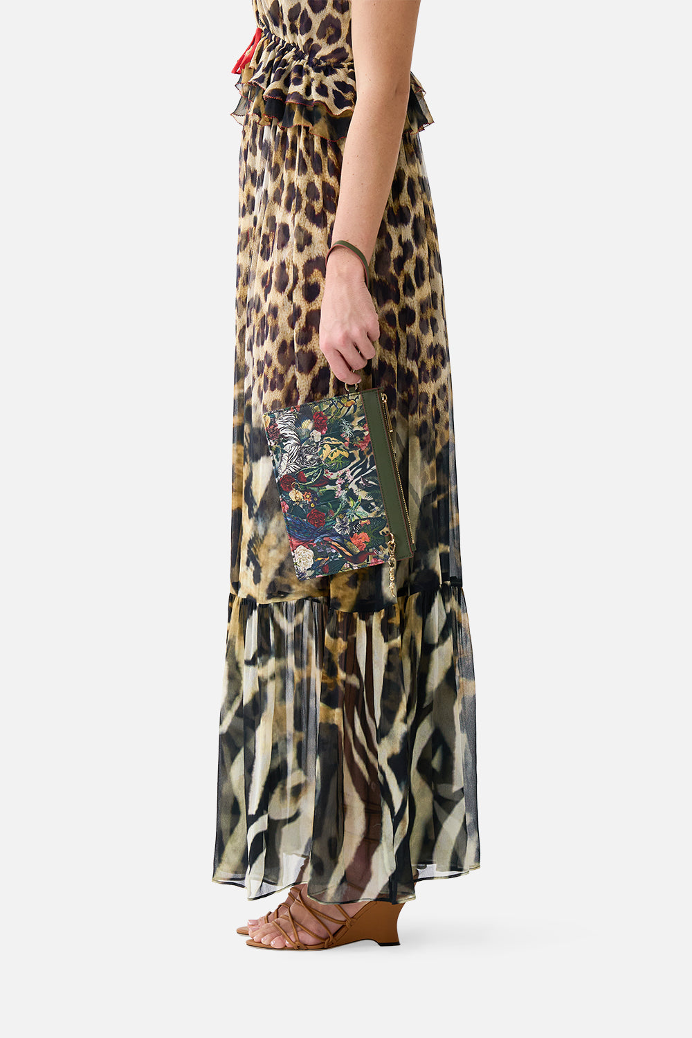The CAMILLA Clutch with Wristlet in our Leotigra Land print, side view on model.