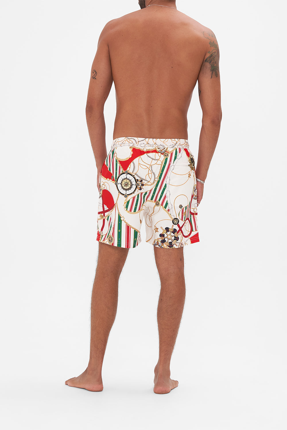 Back view of model wearing Hotel franks By CAMILLA mens boardshort in Saluti Summertime print