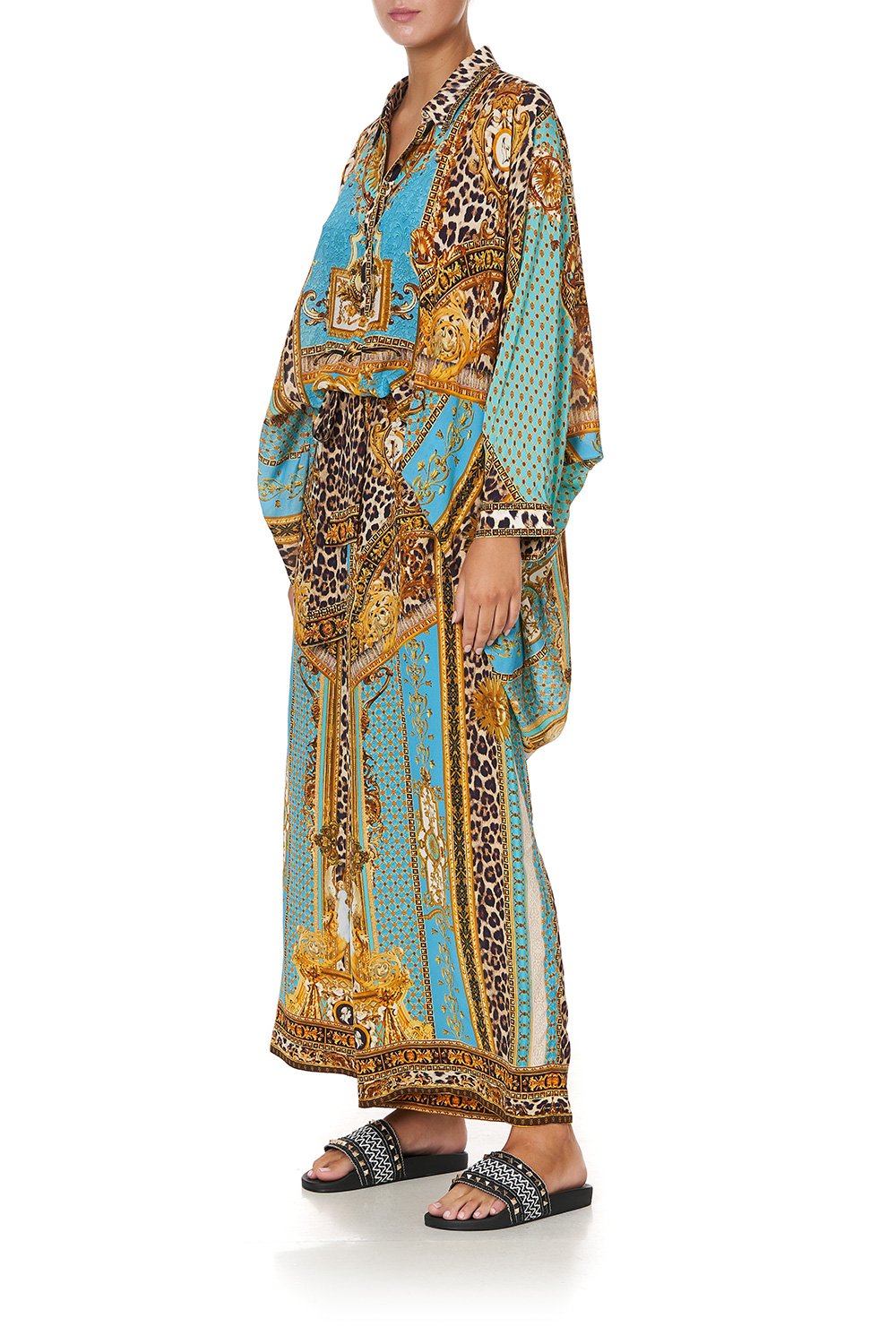 BUTTON UP TOP WITH DRAPED BACK DRIPPING IN DECADENCE