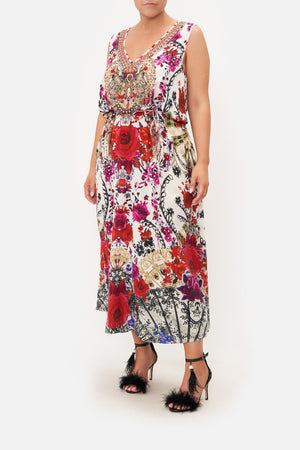 Front view of curvy model wearing CAMILLA plus size floral maxi dress in Reign of Roses print