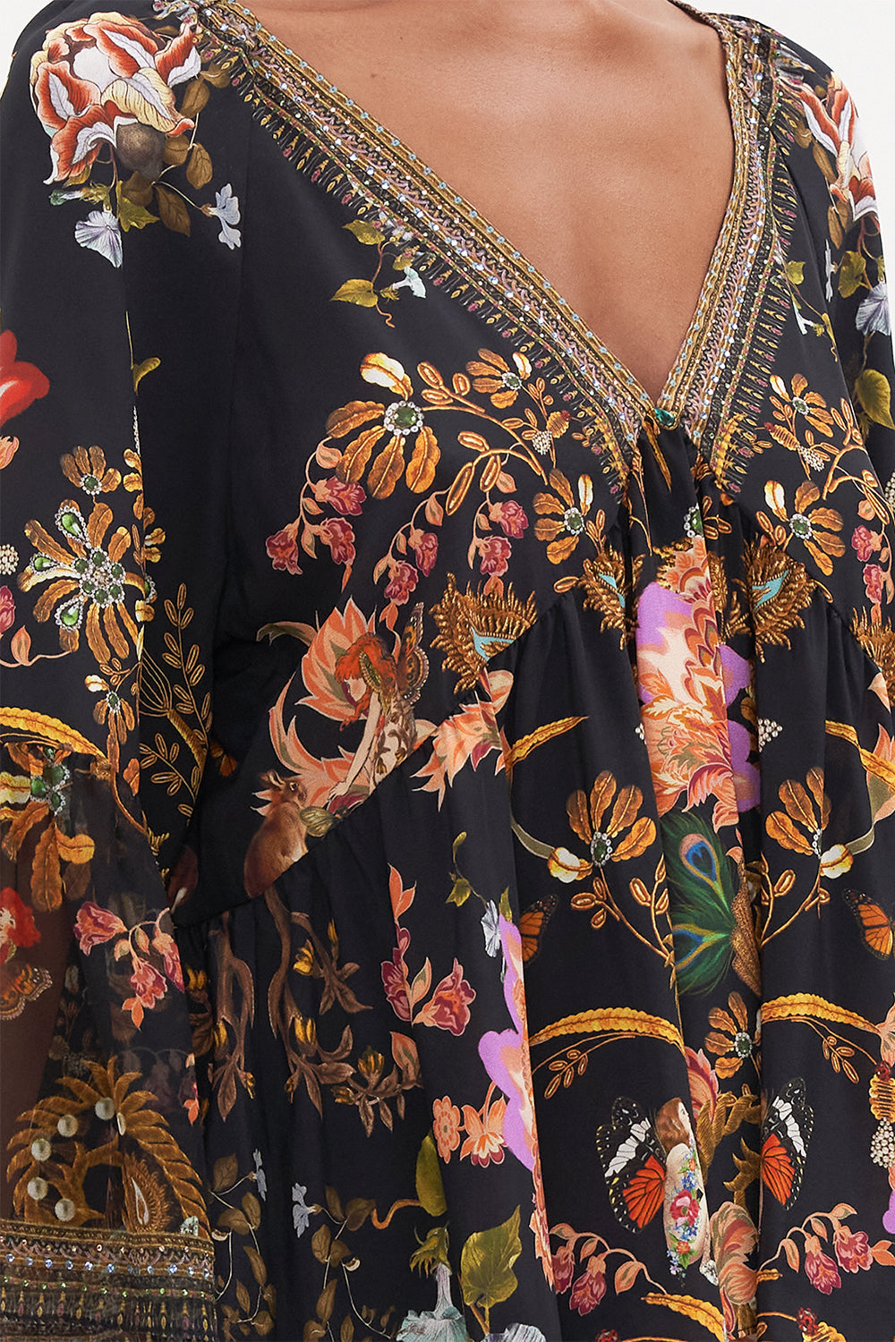 RAGLAN BLOUSE WITH SLEEVE RUFFLE TO CATCH A SPIDER