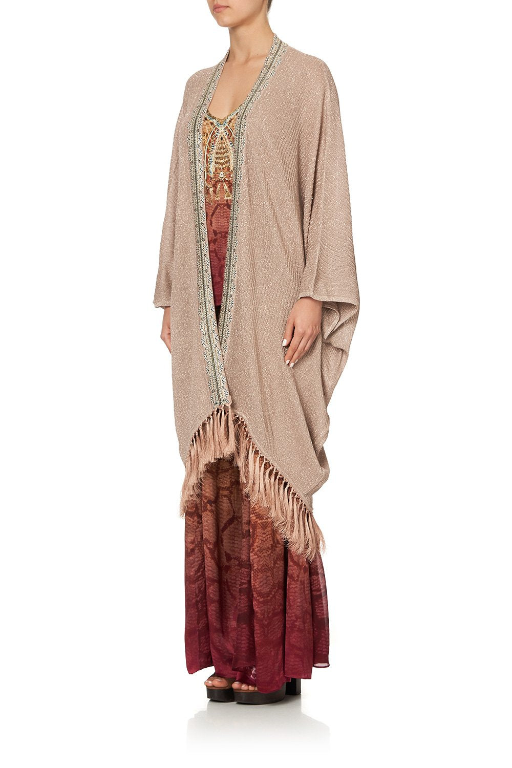 METALLIC KNIT PONCHO WITH TASSELS COASTAL TREASURE